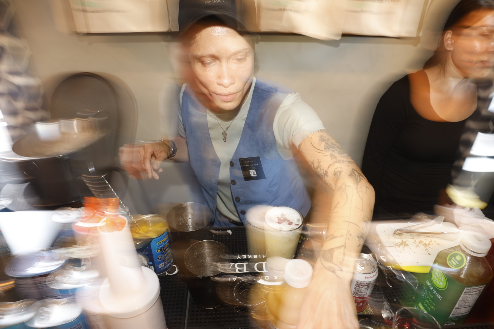 Lena Zakharova in motion at the bar during Human Tech Week 2026 at Hibernia SF