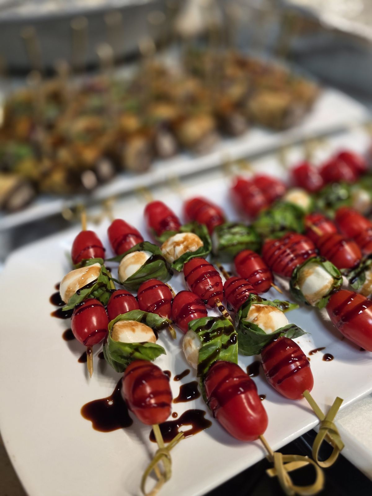 Caprese skewers — fresh mozzarella and tomato